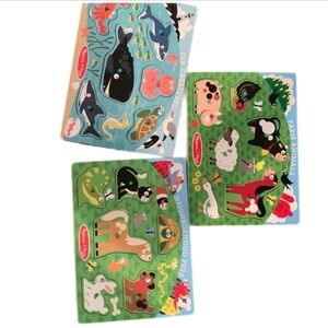 A set of Melissa and Doug developing toddler toys